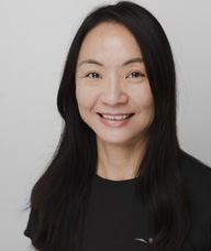 Book an Appointment with Kitty WAN for Hot Stone Massage Therapy